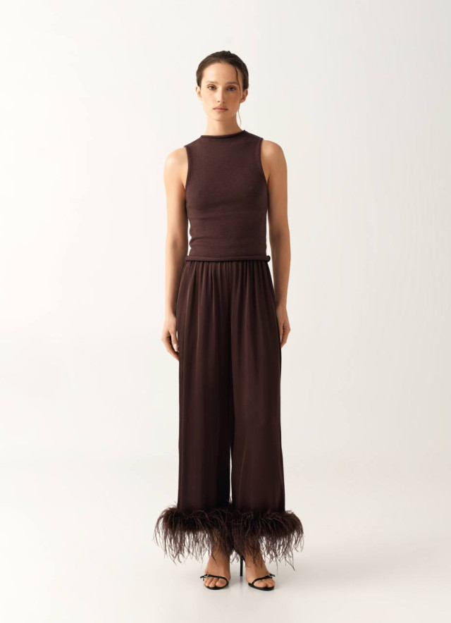 Brown feather-trim pants.