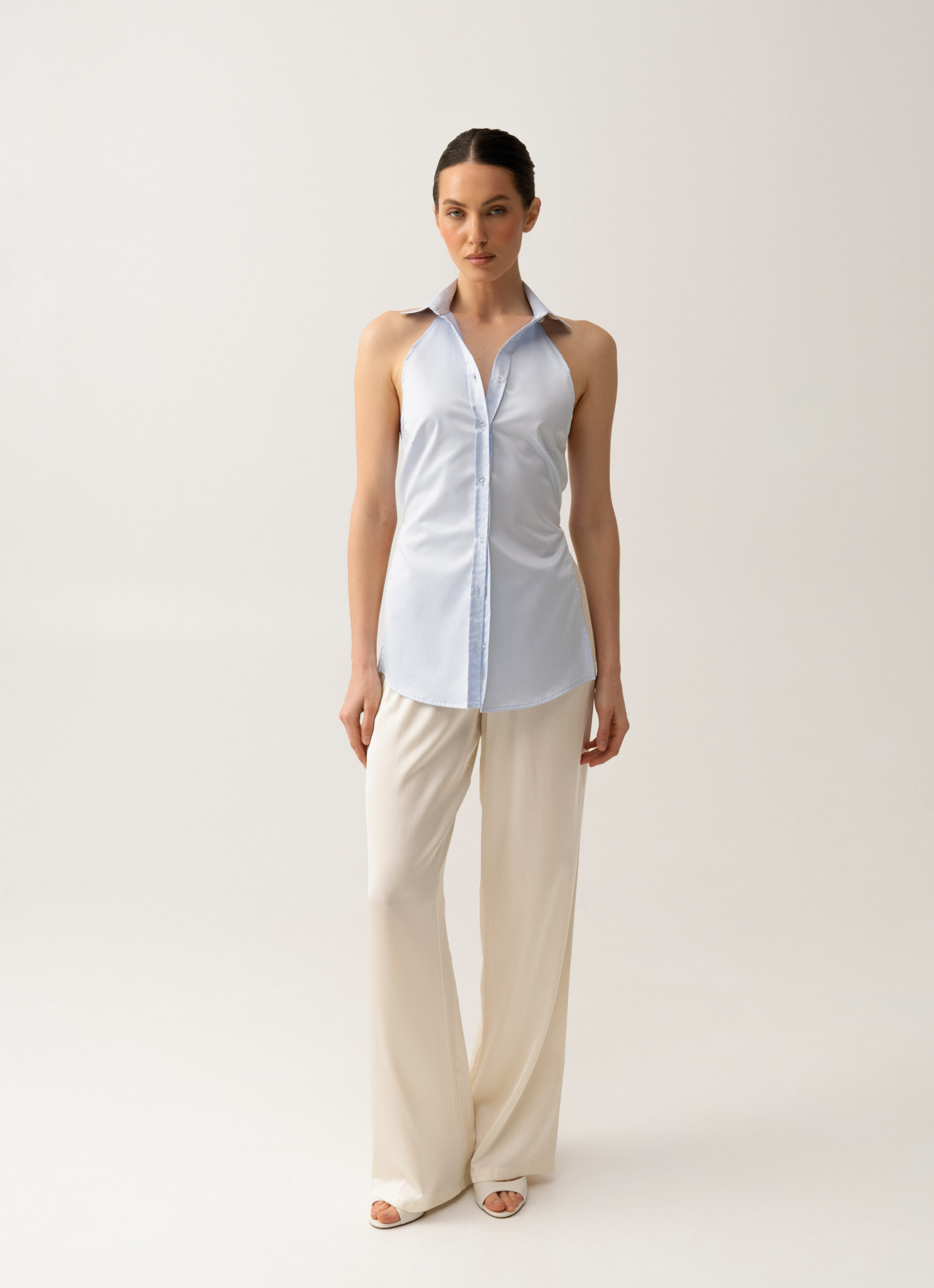 Shirt with an open back