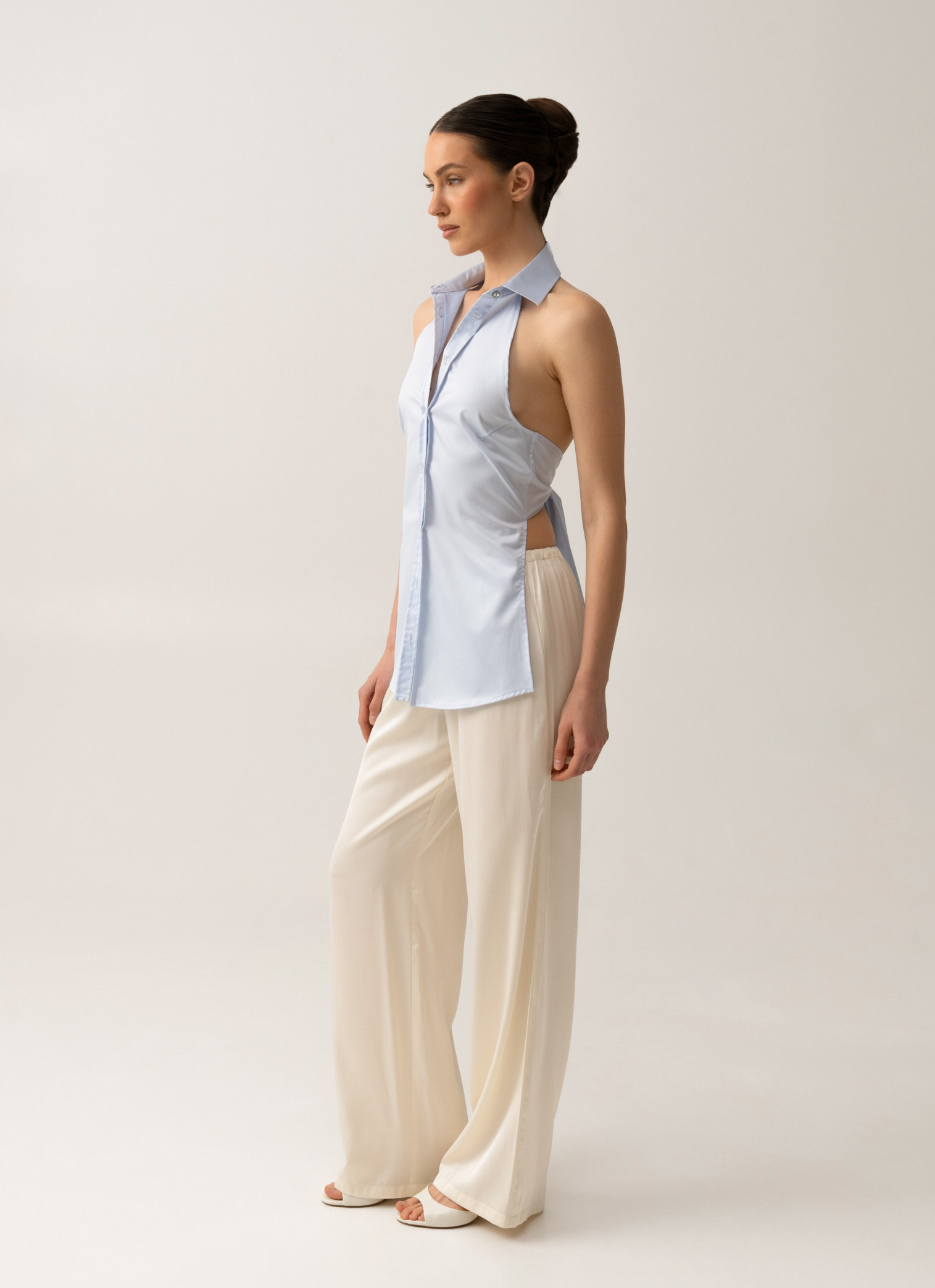 Shirt with an open back