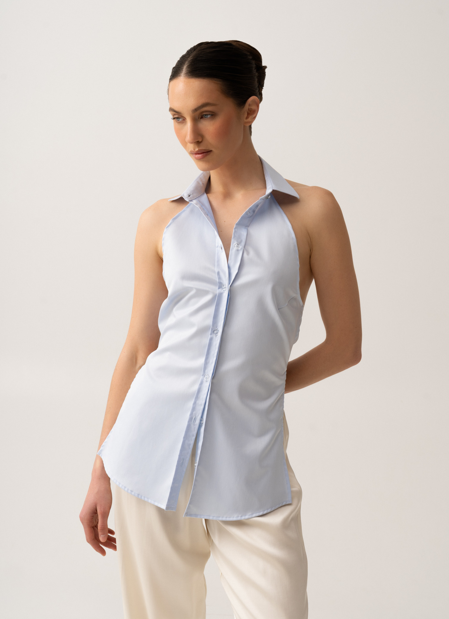 Shirt with an open back